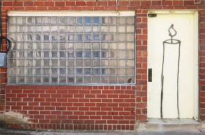 doorwithcandleand120glassbricks